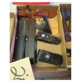 Assorted leather sheaths and holsters