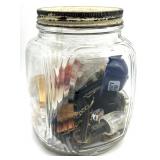 Keychains, Pins, and More in Glass Jar- jar is