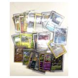 (30) Pokemon Cards in Plastic Sleeves