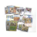 (30) Pokemon Cards in Plastic Sleeves