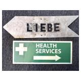 Health Services Plastic Sign and Metal Arrow Sign