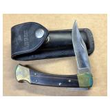 Buck 110 Knife with Leather Case - blade is