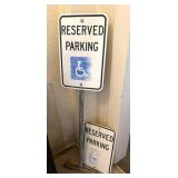 Handicapped Reserve Parking Signs - one is