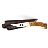 Buck Custom Wolf Cutout Burled Wood Handle