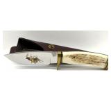 Buck 192T Knife with Elk Fighting Design on Blade