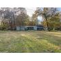 1.45+/- acre tract, 2 BR mobile home, deck, & outbuildings