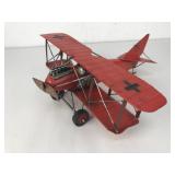 Red Metal Biplane