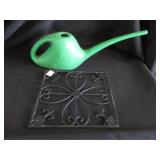 Watering can and garden decor