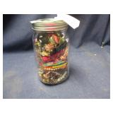 Mason jar with costume jewelry