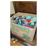 Box of gloves and mits and slippers
