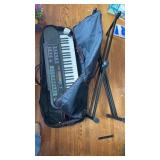 Concertmate 690 keyboard and stand