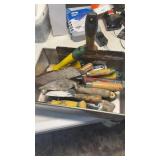 Bin of  potty, knife, scrapers, etc.