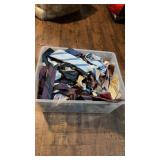 Bin of assorted ties