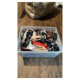 Bin of assorted ties