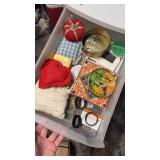 Sewing supplies and pin cushions