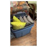 Bin of throw pillows