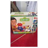 Sesame Street Elmo and puppy