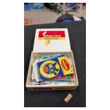 Cigar box of black snaps