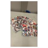 seperate sheets of baseball trading cards