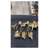 Green fairy figures