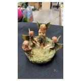 Green fairy figures