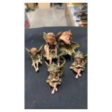 Green fairy figures