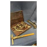 Metal tools in a wood case