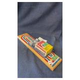 Cribbage board with new cards