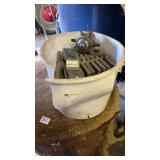 Bucket of metal pieces