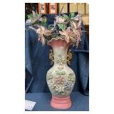 Large ceramic vase with fake flowers