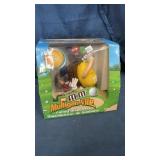 M&M golfing candy dispenser