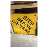 Stop before crossing sign