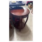 Round wooden side table