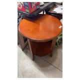 Round wooden side table