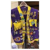 Lions club vest with pins