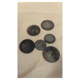 Very heavily circulated silver coins