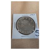 1962 Canadian 'Voyageur' dollar coin, which