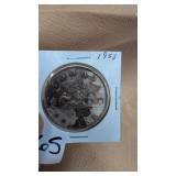 1953 Canadian Voyageur silver dollar.