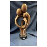 Abstract bronze colored statue
