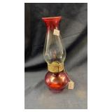 Vintage cranberry colored oil lamp