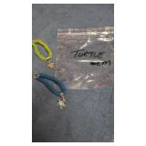 Crafted bracelets with turtle charms