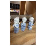 Praying figurines