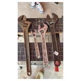 Adjustable wrenches