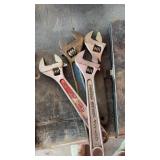 Adjustable wrenches