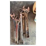 Adjustable wrenches