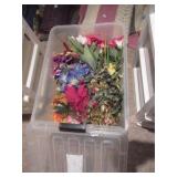 bin of artificial flowers