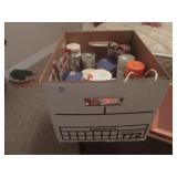 box of adhesive and crafting supplies
