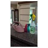Watering can and spray bottles