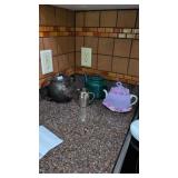 Tea pots and creamer