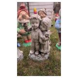 Boy and girl statue
